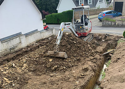 landscaping Digger work By Rose and Tucker Construction.